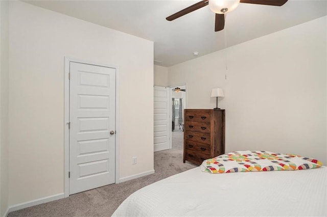 bedroom featuring ceiling fan and light colored carpet