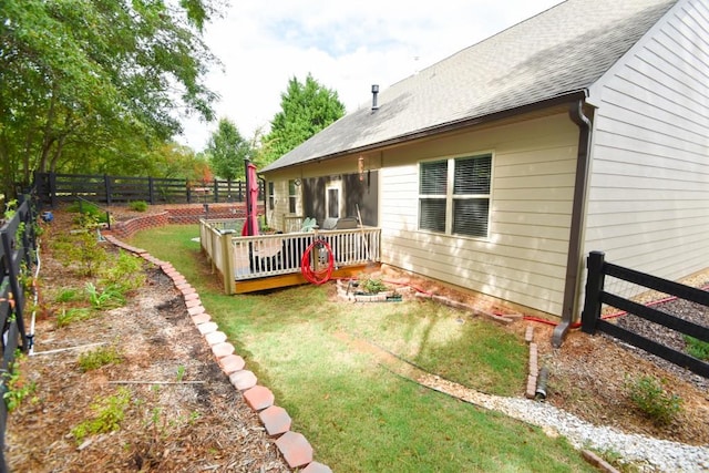 view of yard featuring a deck