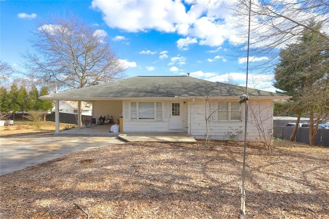 view of front facade featuring a carport