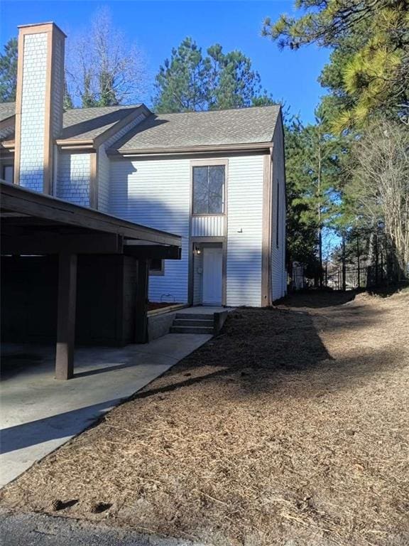 view of front of home with a chimney