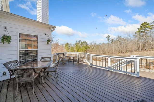 deck featuring outdoor dining space