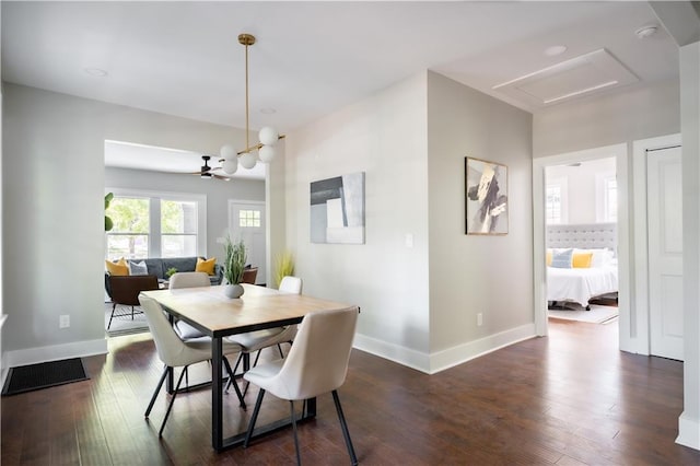 943 Rose Cir SW, Atlanta, GA 30310 - dining room with dark wood-style floors and a chandelier