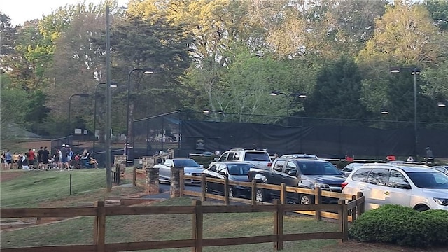 340 Teal Ct, Roswell, GA 30076 - uncovered parking lot featuring a forest view