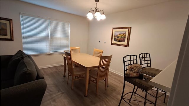 340 Teal Ct, Roswell, GA 30076 - dining room with wood finished floors, baseboards, and a chandelier