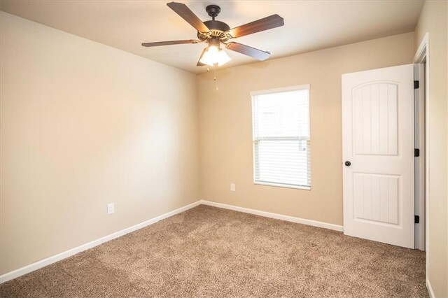610 Sunflower Dr, Canton, GA 30114 - spare room with carpet flooring, ceiling fan, and baseboards