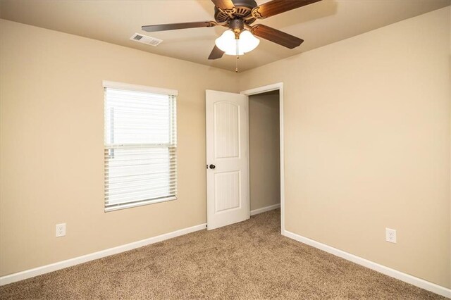 610 Sunflower Dr, Canton, GA 30114 - spare room featuring ceiling fan, carpet flooring, and baseboards