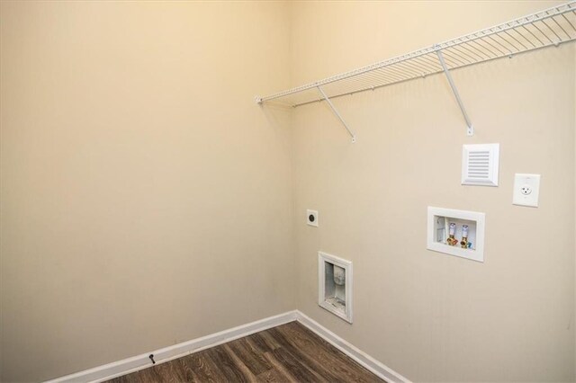 610 Sunflower Dr, Canton, GA 30114 - washroom with electric dryer hookup, baseboards, dark wood-style flooring, and hookup for a washing machine