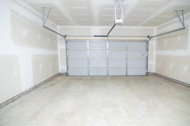 610 Sunflower Dr, Canton, GA 30114 - garage featuring a garage door opener