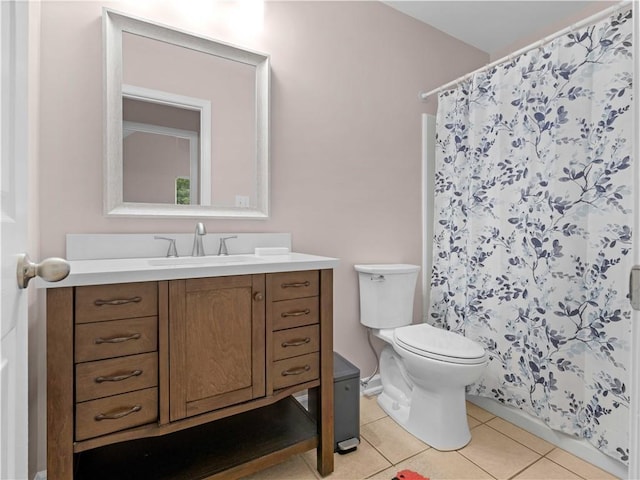 bathroom featuring vanity, tile patterned flooring, toilet, and a shower with shower curtain