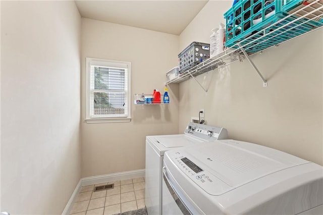 412 Mill Stream Way, Woodstock, GA 30188 - laundry area featuring separate washer and dryer, baseboards, and light tile patterned flooring