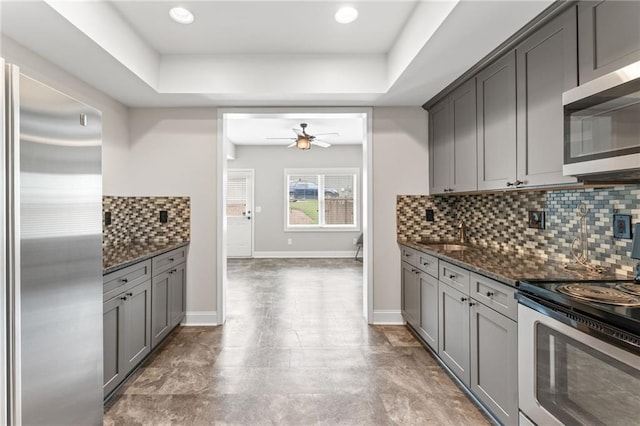 412 Mill Stream Way, Woodstock, GA 30188 - kitchen with stainless steel appliances, gray cabinets, a sink, and a ceiling fan