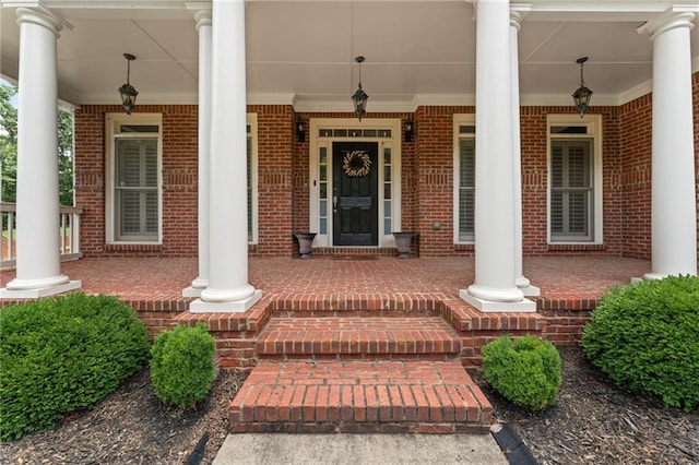 412 Mill Stream Way, Woodstock, GA 30188 - entrance to property with a porch and brick siding