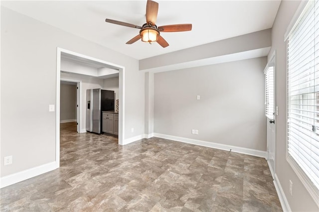 412 Mill Stream Way, Woodstock, GA 30188 - empty room with ceiling fan and baseboards