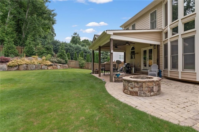 412 Mill Stream Way, Woodstock, GA 30188 - view of yard with a fire pit, a patio area, a ceiling fan, and french doors
