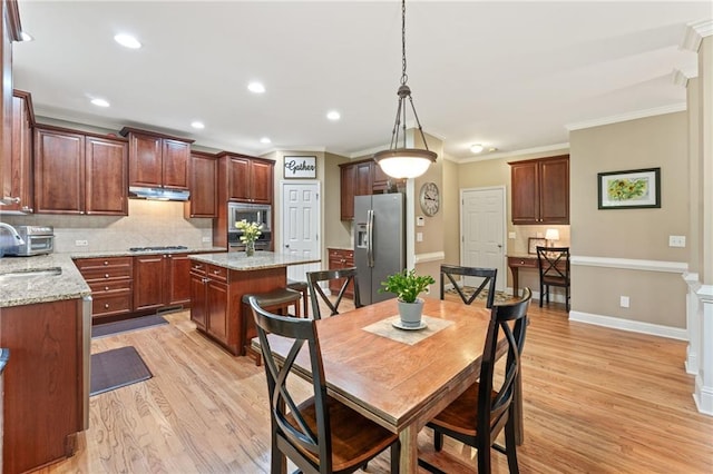 412 Mill Stream Way, Woodstock, GA 30188 - dining room featuring crown molding, light wood-type flooring, baseboards, and recessed lighting