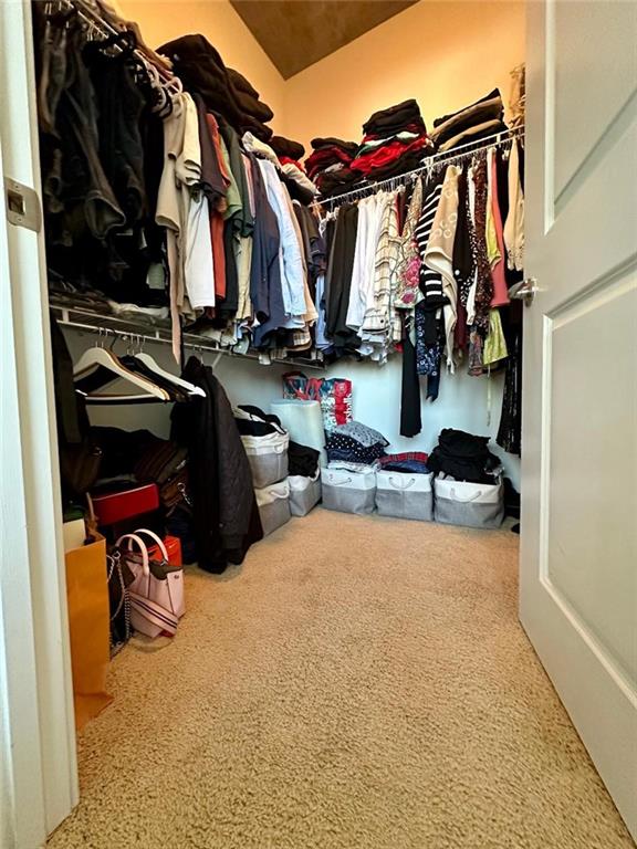 855 Peachtree St NE Unit 1406, Atlanta, GA 30308 - walk in closet featuring carpet flooring