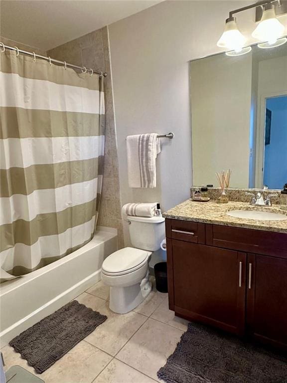 855 Peachtree St NE Unit 1406, Atlanta, GA 30308 - bathroom featuring shower / bath combo with shower curtain, vanity, toilet, tile patterned flooring, and a chandelier