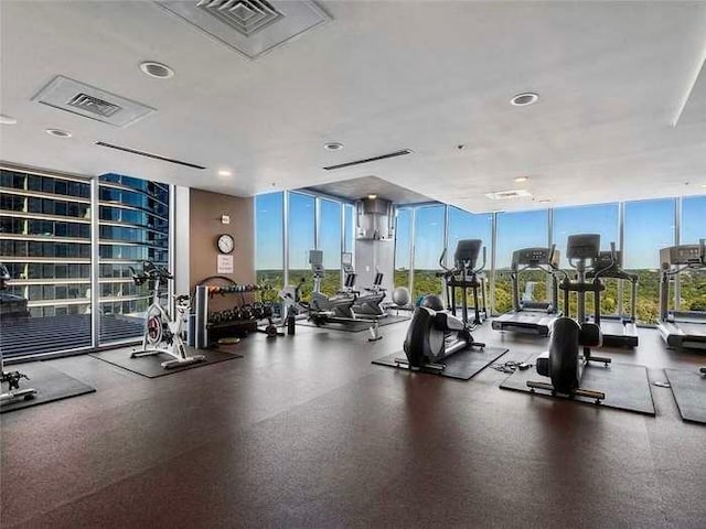 855 Peachtree St NE Unit 1406, Atlanta, GA 30308 - workout area featuring expansive windows and healthy amount of natural light