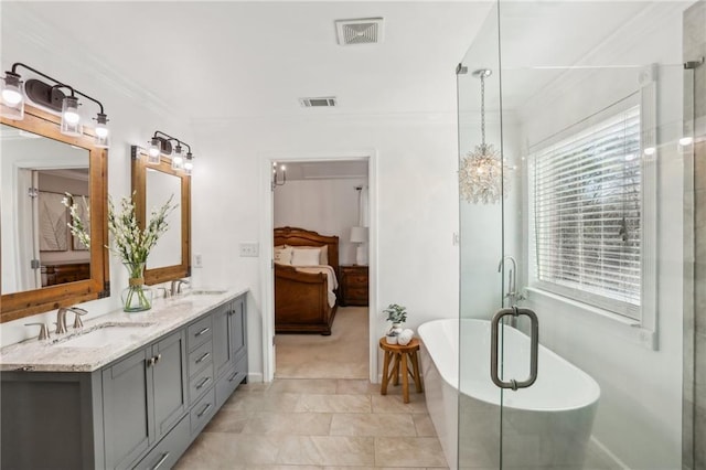 bathroom with connected bathroom, visible vents, ornamental molding, and a sink