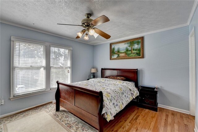 6118 Queen Anne Ct, Norcross, GA 30093 - bedroom featuring baseboards, ornamental molding, wood finished floors, a textured ceiling, and a ceiling fan
