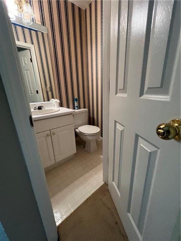 11 Seabreeze Way, Dawsonville, GA 30534 - bathroom featuring vanity and wallpapered walls
