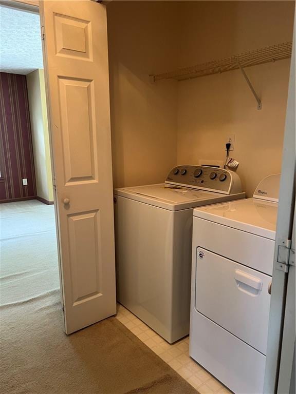 11 Seabreeze Way, Dawsonville, GA 30534 - laundry area with washing machine and dryer and light colored carpet