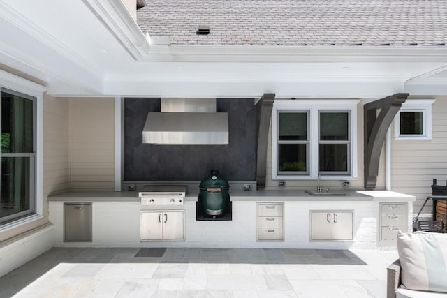 view of patio / terrace featuring a grill, exterior kitchen, and sink