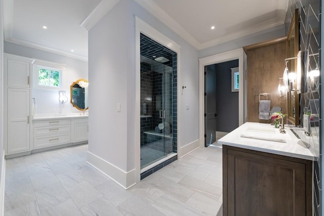 bathroom with vanity, walk in shower, and ornamental molding