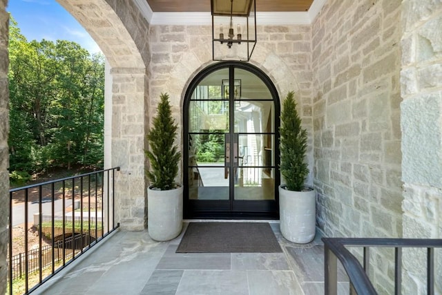 entrance to property featuring french doors