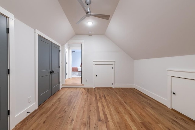 bonus room featuring ceiling fan, light hardwood / wood-style flooring, and vaulted ceiling