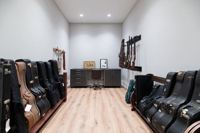 office area with light hardwood / wood-style floors