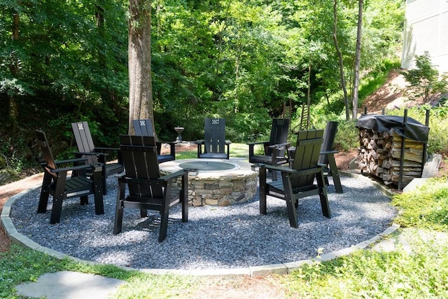 exterior space with a patio area and a fire pit