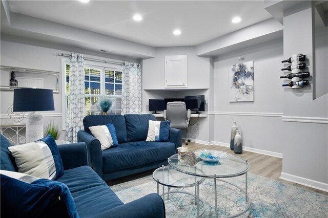 living room with light hardwood / wood-style floors