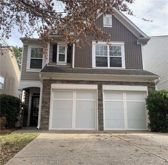 view of front of home with a garage