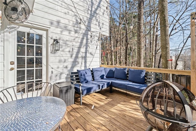 deck with an outdoor living space