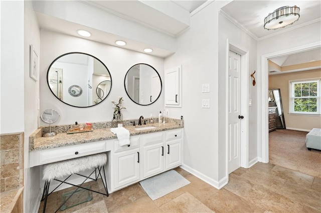 bathroom with vanity and crown molding