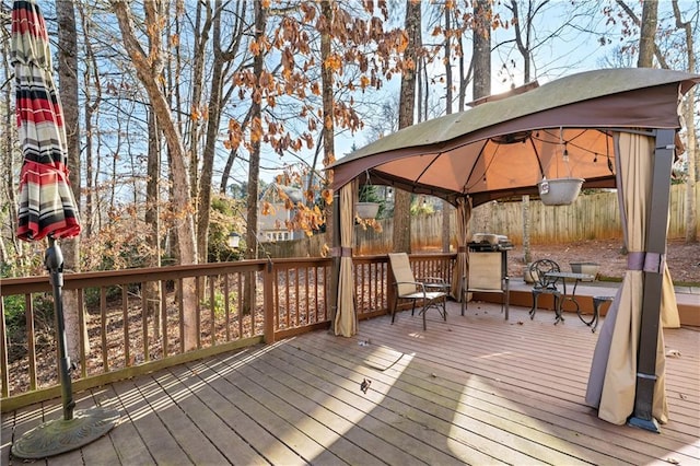 deck with a gazebo and grilling area