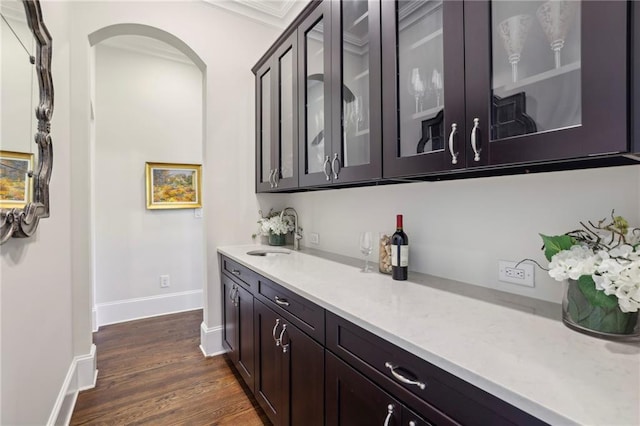 3005 Evelyn Ln, Alpharetta, GA 30004 - bar area featuring arched walkways, dark wood-style floors, and ornamental molding
