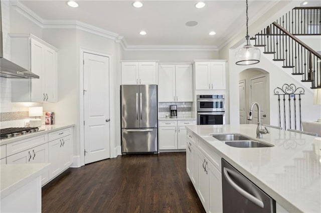 3005 Evelyn Ln, Alpharetta, GA 30004 - kitchen with stainless steel appliances, wall chimney exhaust hood, white cabinets, decorative light fixtures, and dark wood-style flooring