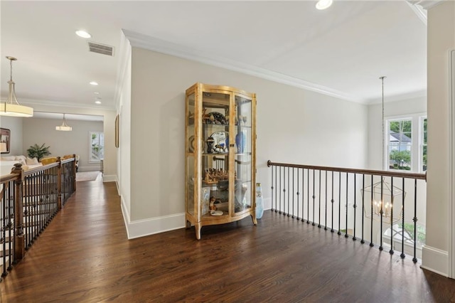 3005 Evelyn Ln, Alpharetta, GA 30004 - hallway featuring wood finished floors, healthy amount of natural light, an upstairs landing, crown molding, and recessed lighting