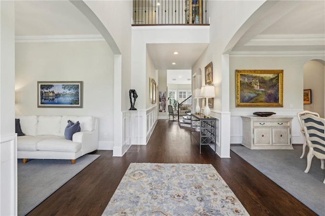 3005 Evelyn Ln, Alpharetta, GA 30004 - entrance foyer featuring arched walkways, wood finished floors, crown molding, and stairs