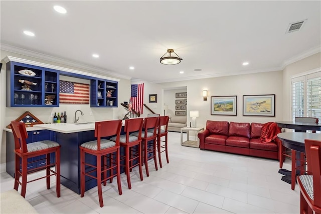 3005 Evelyn Ln, Alpharetta, GA 30004 - dining space with crown molding, bar with sink, and recessed lighting