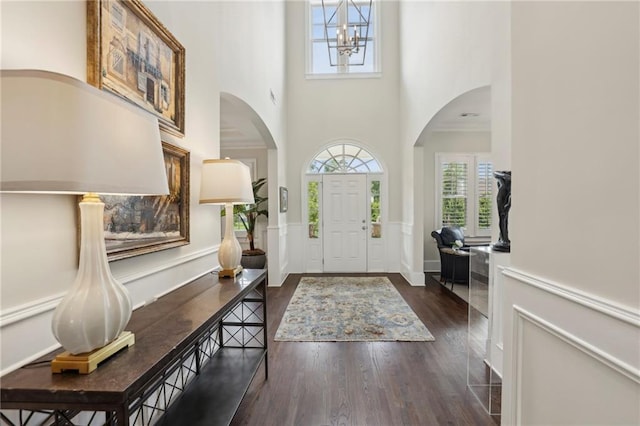 3005 Evelyn Ln, Alpharetta, GA 30004 - entrance foyer featuring healthy amount of natural light, dark wood-type flooring, arched walkways, and a high ceiling