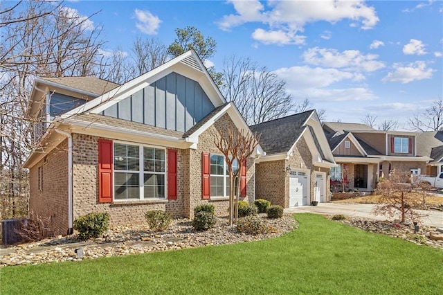 view of front of house featuring a garage and a front yard