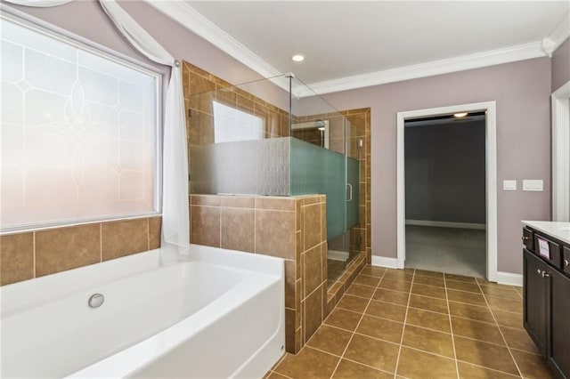 bathroom featuring vanity, crown molding, tile patterned floors, and separate shower and tub