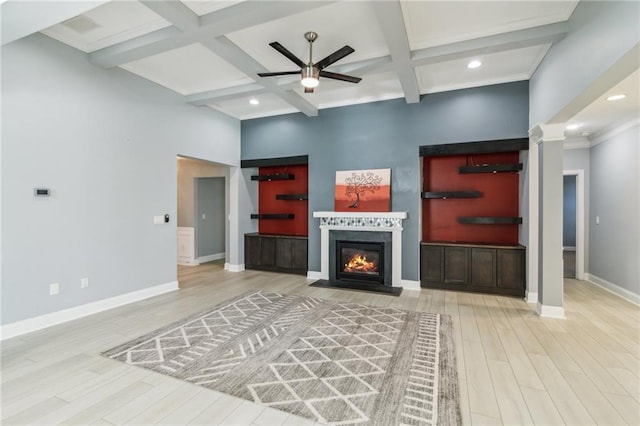 living room with hardwood / wood-style flooring, ceiling fan, beam ceiling, decorative columns, and coffered ceiling