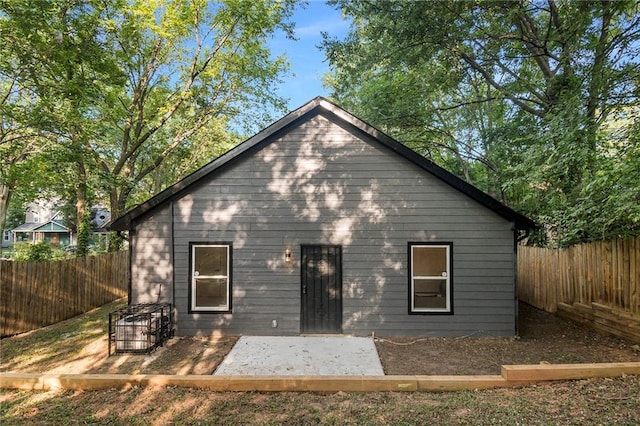 back of property featuring a patio