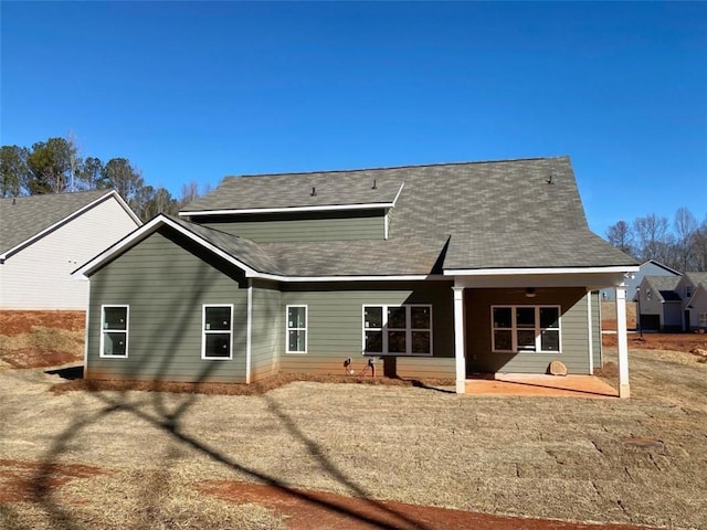 back of property featuring a patio area