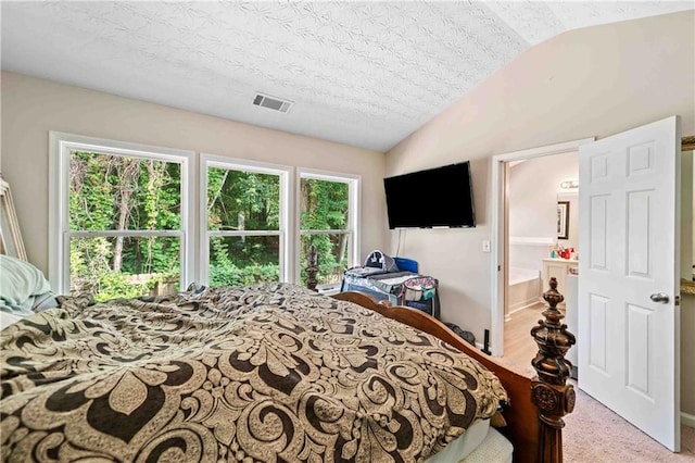 4161 Magnolia Glen Walk, Norcross, GA 30093 - bedroom with vaulted ceiling, light colored carpet, and a textured ceiling
