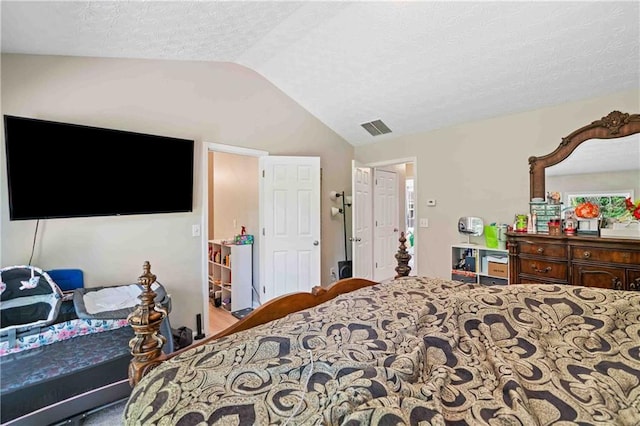 4161 Magnolia Glen Walk, Norcross, GA 30093 - bedroom with lofted ceiling and a textured ceiling